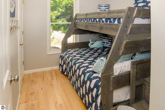 314 Leelanau Ave, Frankfort, MI 49635 - bedroom with baseboards and wood finished floors