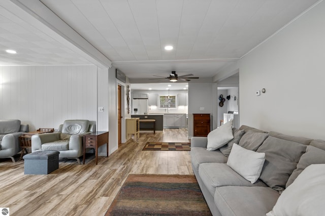 7256 Highland Dr, Beulah, MI 49617 - living area featuring light wood-type flooring, a ceiling fan, and recessed lighting