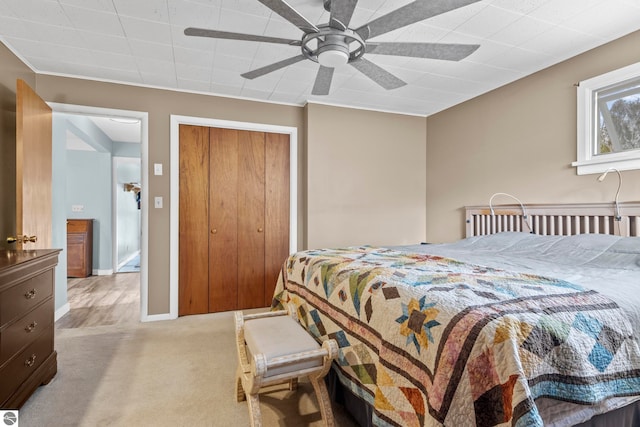 7256 Highland Dr, Beulah, MI 49617 - carpeted bedroom featuring a closet and ceiling fan