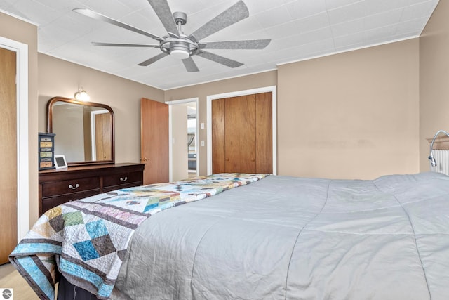 7256 Highland Dr, Beulah, MI 49617 - bedroom with a ceiling fan