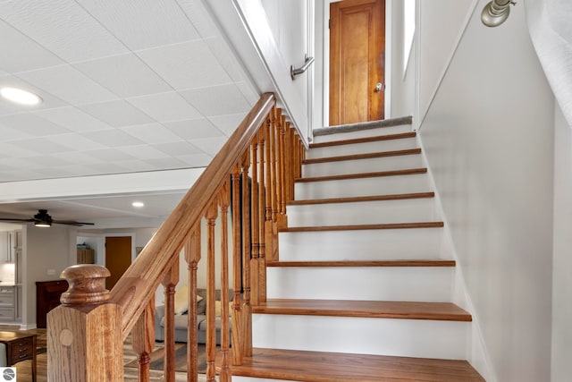 7256 Highland Dr, Beulah, MI 49617 - stairs with a ceiling fan and recessed lighting