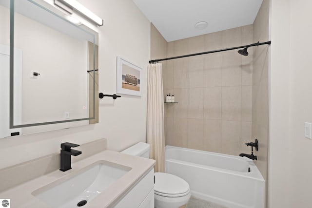 708 Randolph St Unit 204, Traverse City, MI 49684 - full bathroom with toilet, vanity, and shower / tub combo with curtain