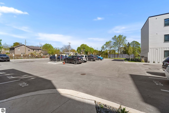 708 Randolph St Unit 204, Traverse City, MI 49684 - view of uncovered parking lot
