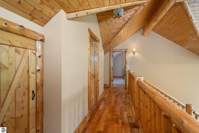 5592 Troon N, Bellaire, MI 49615 - hall with hardwood / wood-style flooring and an upstairs landing