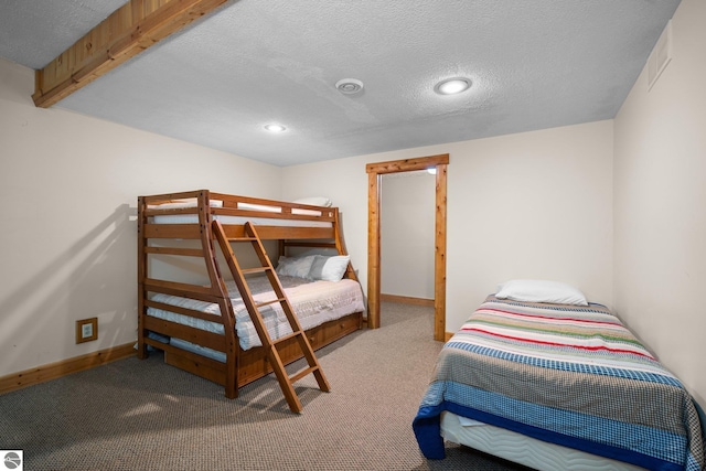 5592 Troon N, Bellaire, MI 49615 - carpeted bedroom with a textured ceiling, baseboards, and recessed lighting
