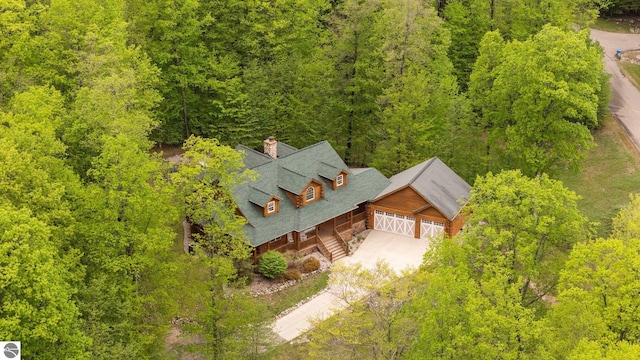 5592 Troon N, Bellaire, MI 49615 - view of subject property featuring a heavily wooded area