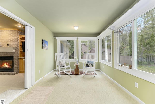 6647 E Harbor Dr, Elk Rapids, MI 49629 - sunroom with carpet flooring and baseboards