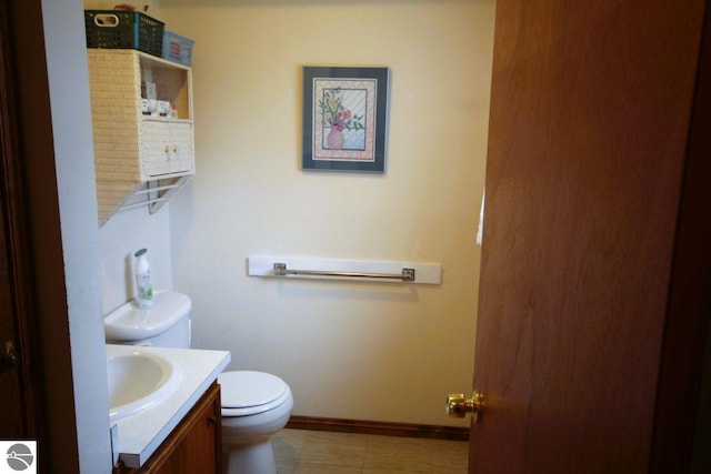 161 Huntinghorn Dr, Roscommon, MI 48653 - half bath featuring toilet, vanity, and baseboards