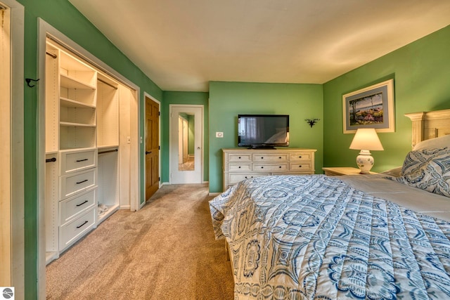 310 W Broadway, Suttons Bay, MI 49682 - bedroom with light carpet and baseboards