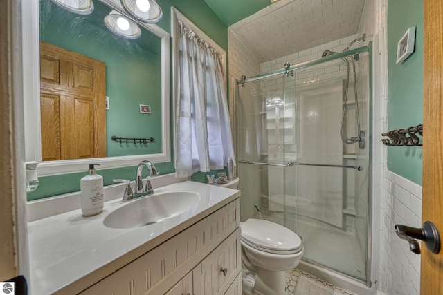310 W Broadway, Suttons Bay, MI 49682 - bathroom with a shower stall, toilet, and vanity