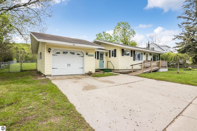 8695 S Maple City Rd, Maple City, MI 49664 - single story home with concrete driveway and a garage