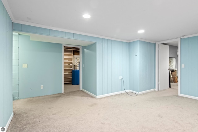 8695 S Maple City Rd, Maple City, MI 49664 - finished basement featuring carpet flooring, recessed lighting, wooden walls, and crown molding
