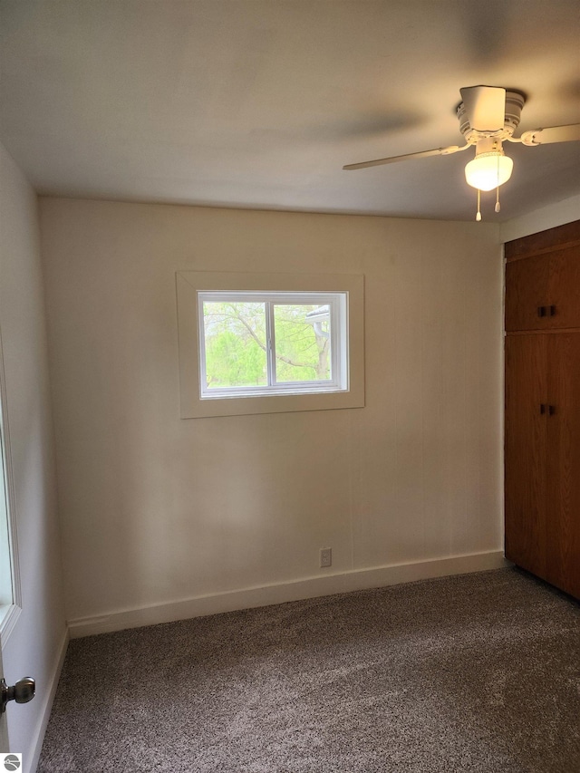8540 W Monroe, Elwell, MI 48832 - unfurnished bedroom with carpet flooring, baseboards, and ceiling fan