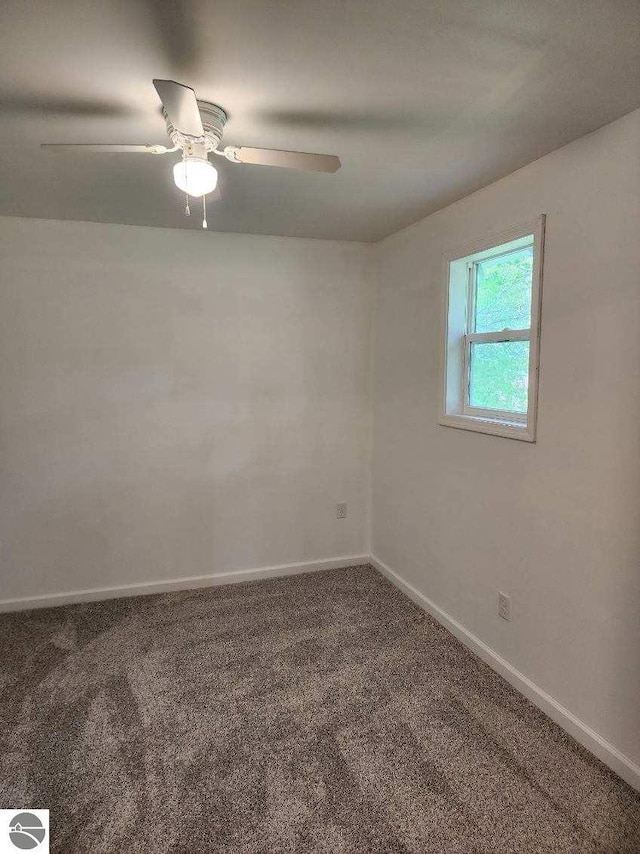 8540 W Monroe, Elwell, MI 48832 - carpeted empty room with baseboards and a ceiling fan