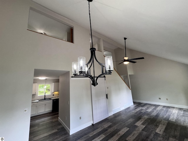 4872 E Shore Dr NE, Kalkaska, MI 49646 - detailed view of a chandelier, ceiling fan, wood finished floors, and baseboards