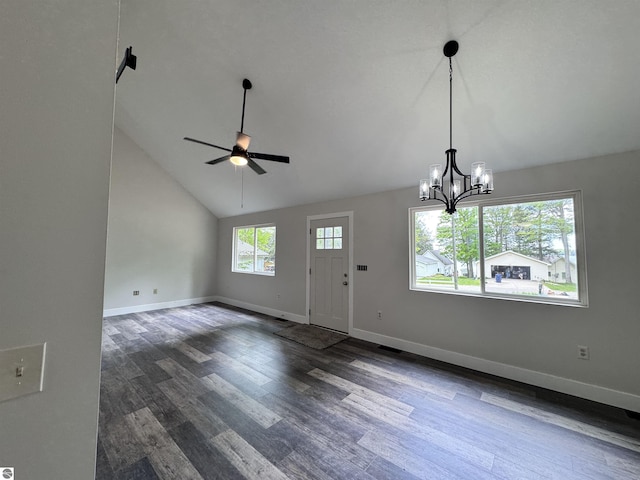 4872 E Shore Dr NE, Kalkaska, MI 49646 - entrance foyer with ceiling fan, lofted ceiling, dark wood-style flooring, baseboards, and a chandelier