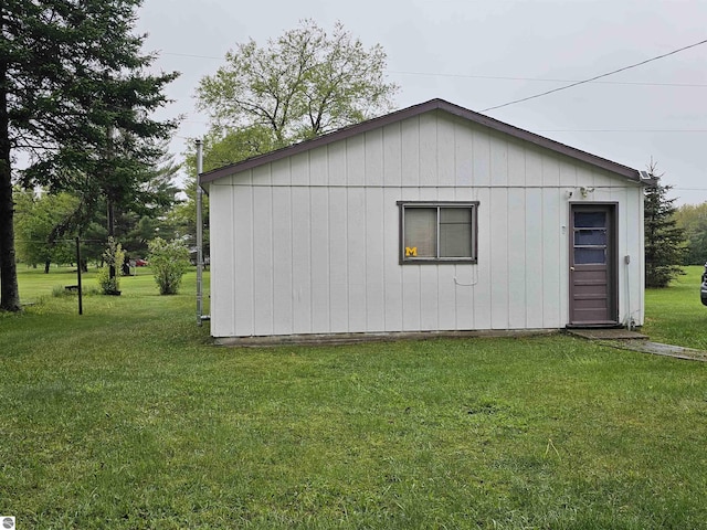 3058 Brodie Rd, South Branch, MI 48761 - view of side of home featuring a lawn