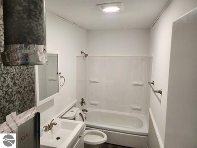 2620 N Huron, Tawas City, MI 48763 - full bath featuring toilet, vanity, and washtub / shower combination