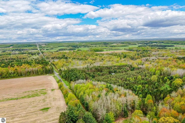 1151 N 8 Mile Rd, Lake City, MI 49651 - drone / aerial view of a heavily wooded area