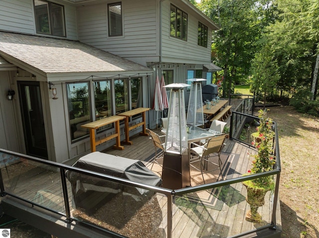 4283 Maitland Rd, Williamsburg, MI 49690 - wooden deck with outdoor dining space