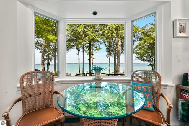 4283 Maitland Rd, Williamsburg, MI 49690 - sunroom featuring a water view