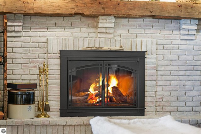 4283 Maitland Rd, Williamsburg, MI 49690 - detailed view of a brick fireplace
