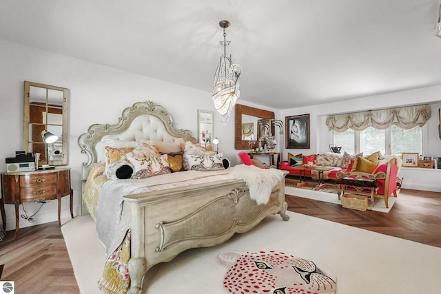 4283 Maitland Rd, Williamsburg, MI 49690 - bedroom featuring a chandelier