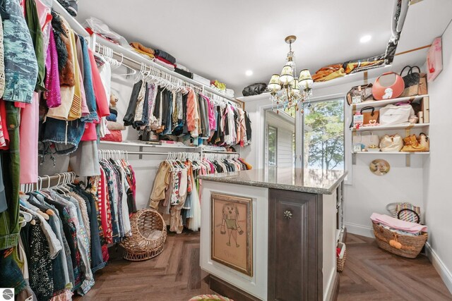 4283 Maitland Rd, Williamsburg, MI 49690 - walk in closet featuring a chandelier