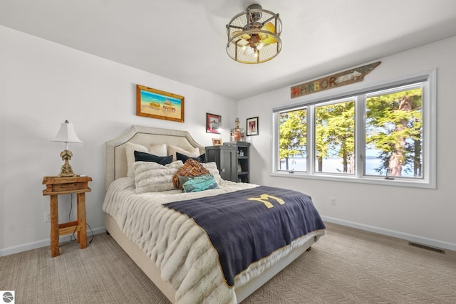 4283 Maitland Rd, Williamsburg, MI 49690 - bedroom with carpet floors and baseboards