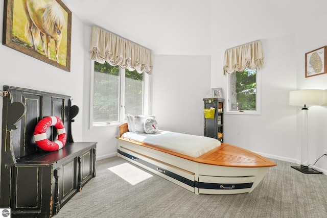 4283 Maitland Rd, Williamsburg, MI 49690 - bedroom featuring carpet floors and baseboards