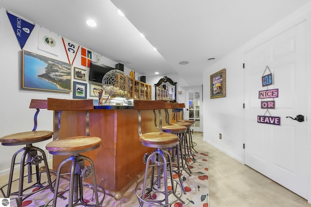 4283 Maitland Rd, Williamsburg, MI 49690 - indoor wet bar with baseboards and recessed lighting