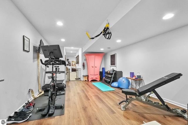 4283 Maitland Rd, Williamsburg, MI 49690 - workout room with light wood finished floors and recessed lighting