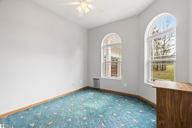 2769 White Rd, Frankfort, MI 49635 - empty room with carpet flooring, healthy amount of natural light, and baseboards