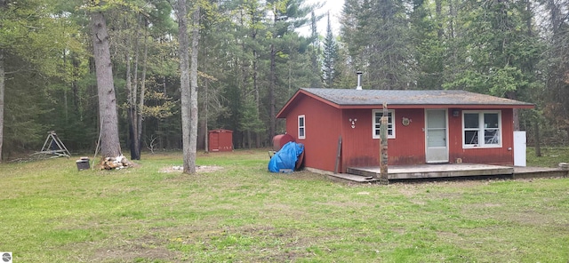 6031 Collins Rd, Onaway, MI 49765 - view of outbuilding featuring a wooded view