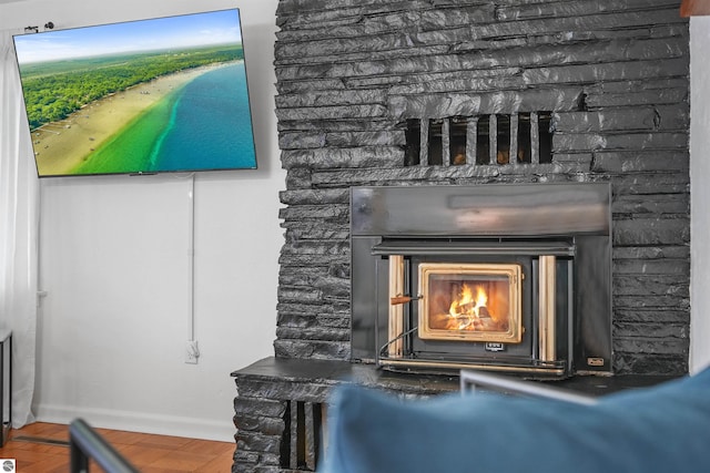 104 Haines Ave, Roscommon, MI 48653 - detailed view of a fireplace and baseboards