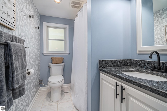 104 Haines Ave, Roscommon, MI 48653 - bathroom with vanity, toilet, and marble finish floors