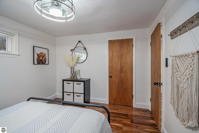 104 Haines Ave, Roscommon, MI 48653 - bedroom featuring wood finished floors and baseboards