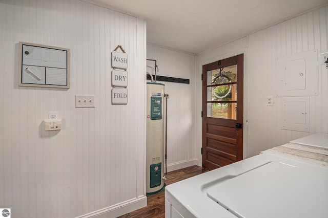 104 Haines Ave, Roscommon, MI 48653 - washroom featuring independent washer and dryer, dark wood-type flooring, and water heater