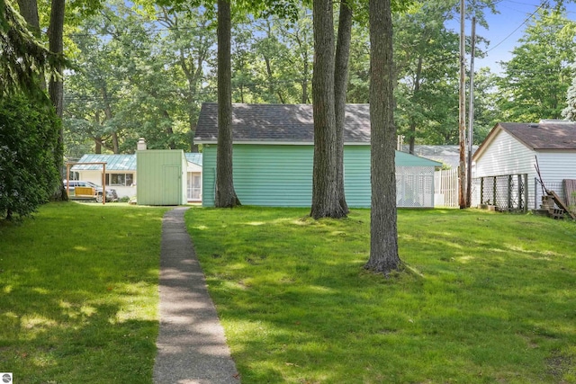 104 Haines Ave, Roscommon, MI 48653 - view of yard with an outdoor structure