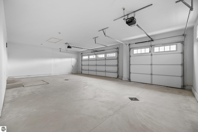 11964 E Shaker Trl, Suttons Bay, MI 49682 - garage with a garage door opener
