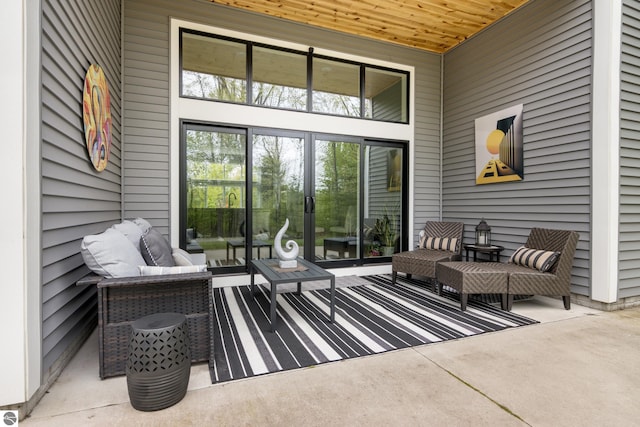 8906A Manhattan N Unit A, Traverse City, MI 49685 - view of patio / terrace with an outdoor living space