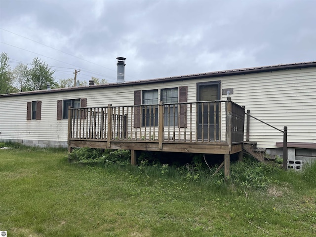 118 W Huron, Omer, MI 48749 - back of house with a wooden deck and crawl space