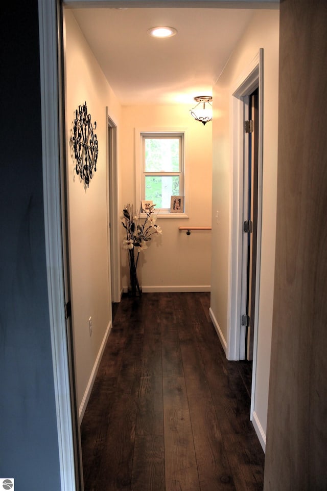 3690 Rau Rd, West Branch, MI 48661 - hallway with dark wood-type flooring, recessed lighting, and baseboards