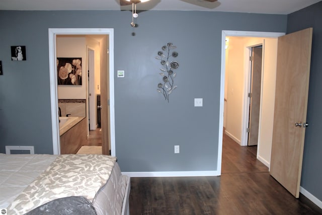 3690 Rau Rd, West Branch, MI 48661 - bedroom featuring wood finished floors and baseboards