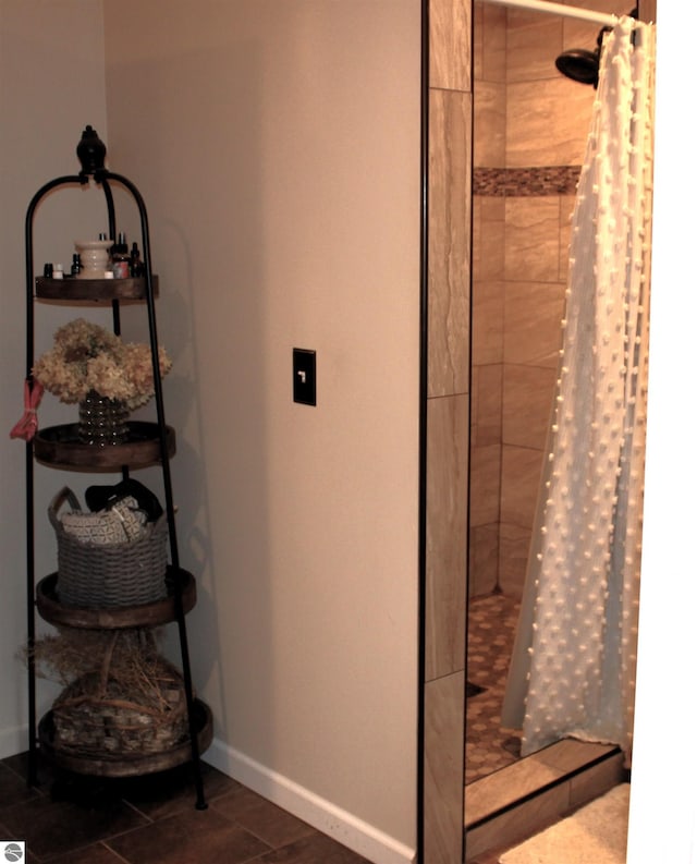 3690 Rau Rd, West Branch, MI 48661 - full bathroom with tiled shower and baseboards