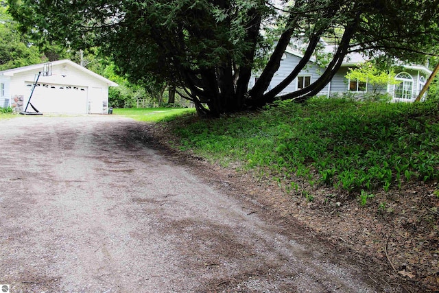 3690 Rau Rd, West Branch, MI 48661 - exterior space with a detached garage