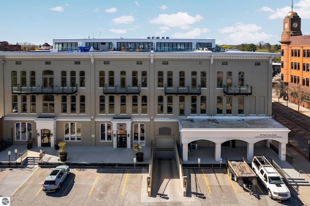 109 E Front St # 213, Traverse City, MI 49684 - view of property with uncovered parking