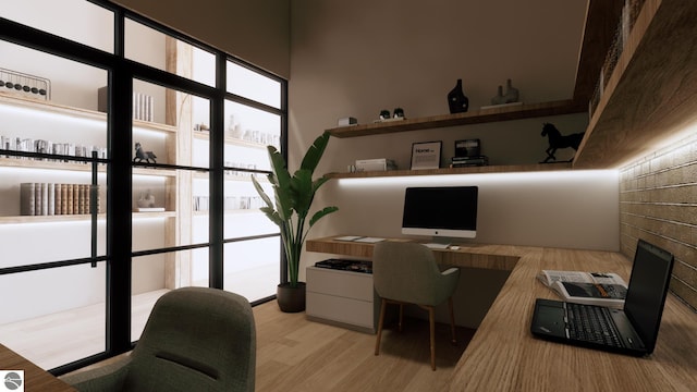 109 E Front St # 213, Traverse City, MI 49684 - office with wood finished floors and built in desk