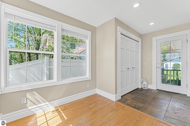3151 W Lake Mitchell Dr, Cadillac, MI 49601 - entrance foyer with baseboards and recessed lighting