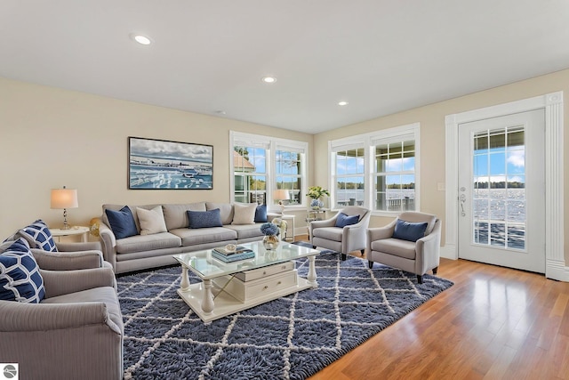 3151 W Lake Mitchell Dr, Cadillac, MI 49601 - living area featuring wood finished floors and recessed lighting